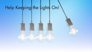 A photo with a blue and purple gradient background with five incandescent light bulbs hanging from black cords from the top of the image. The bulbs are touching and the bulb on the right is swung outwards as if the bulbs were part of a Newton's Cradle desk toy. The image fades to white at the bottom. "Help Keeping the Lights On" is written across the top.